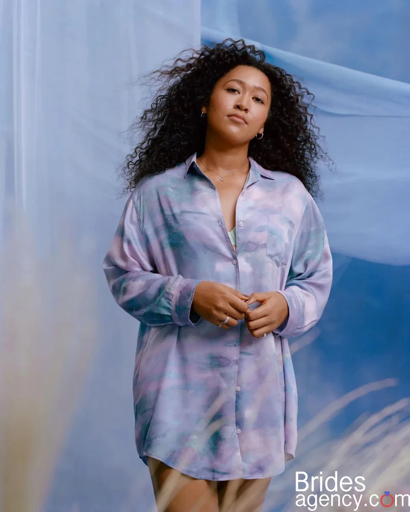 Naomi Osaka in a blue shirt
