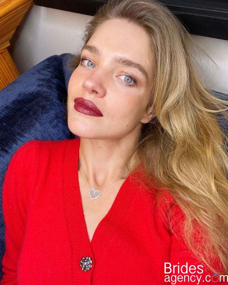 Natalia Vodianova in a red sweater