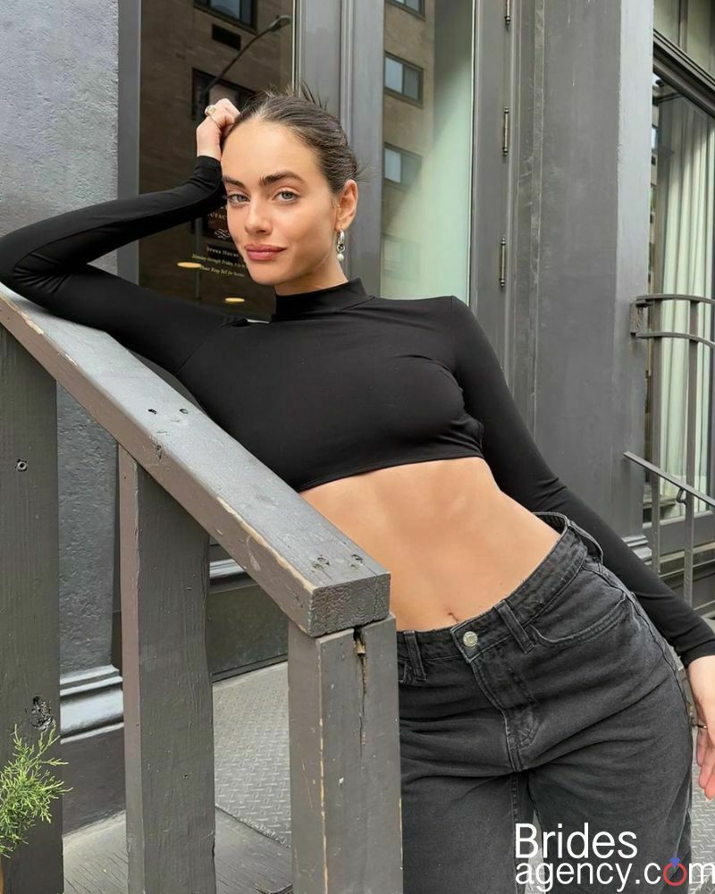 Yael Shelbia leaned against the railing