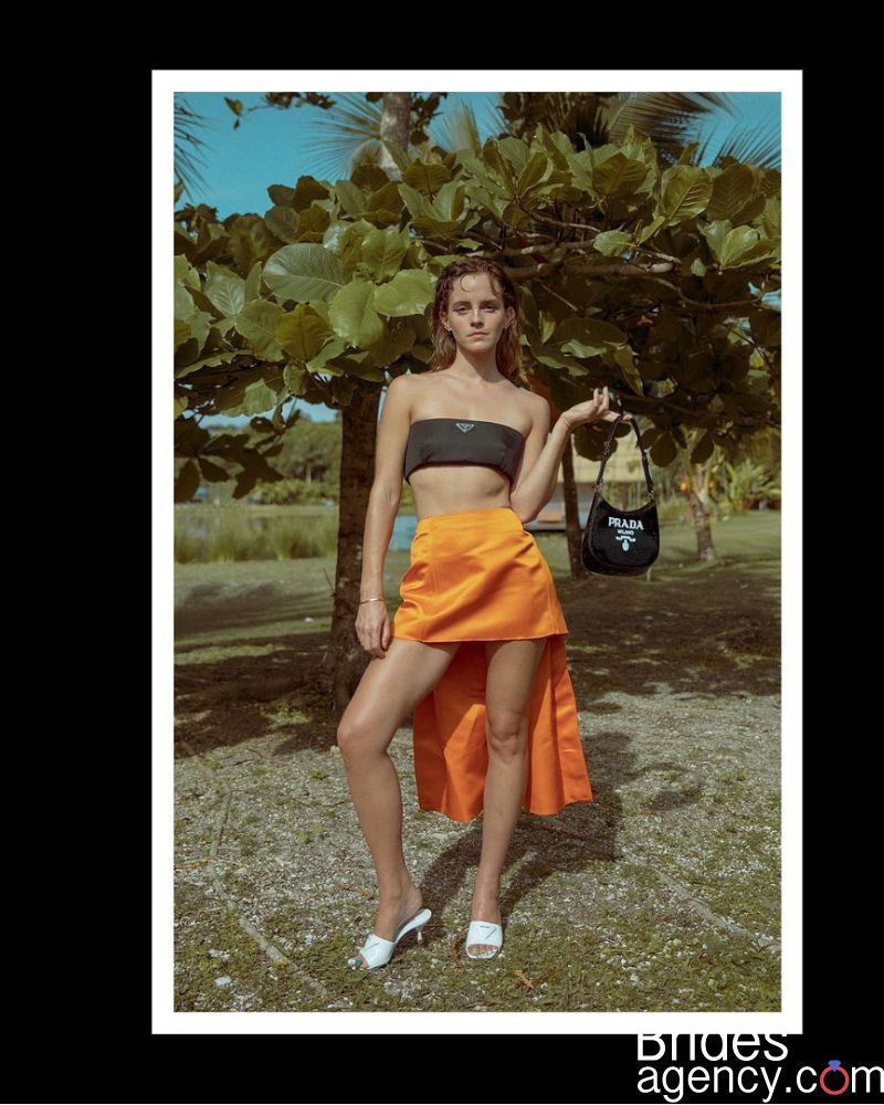 A stylish photo of Emma Watson in a summer outfit